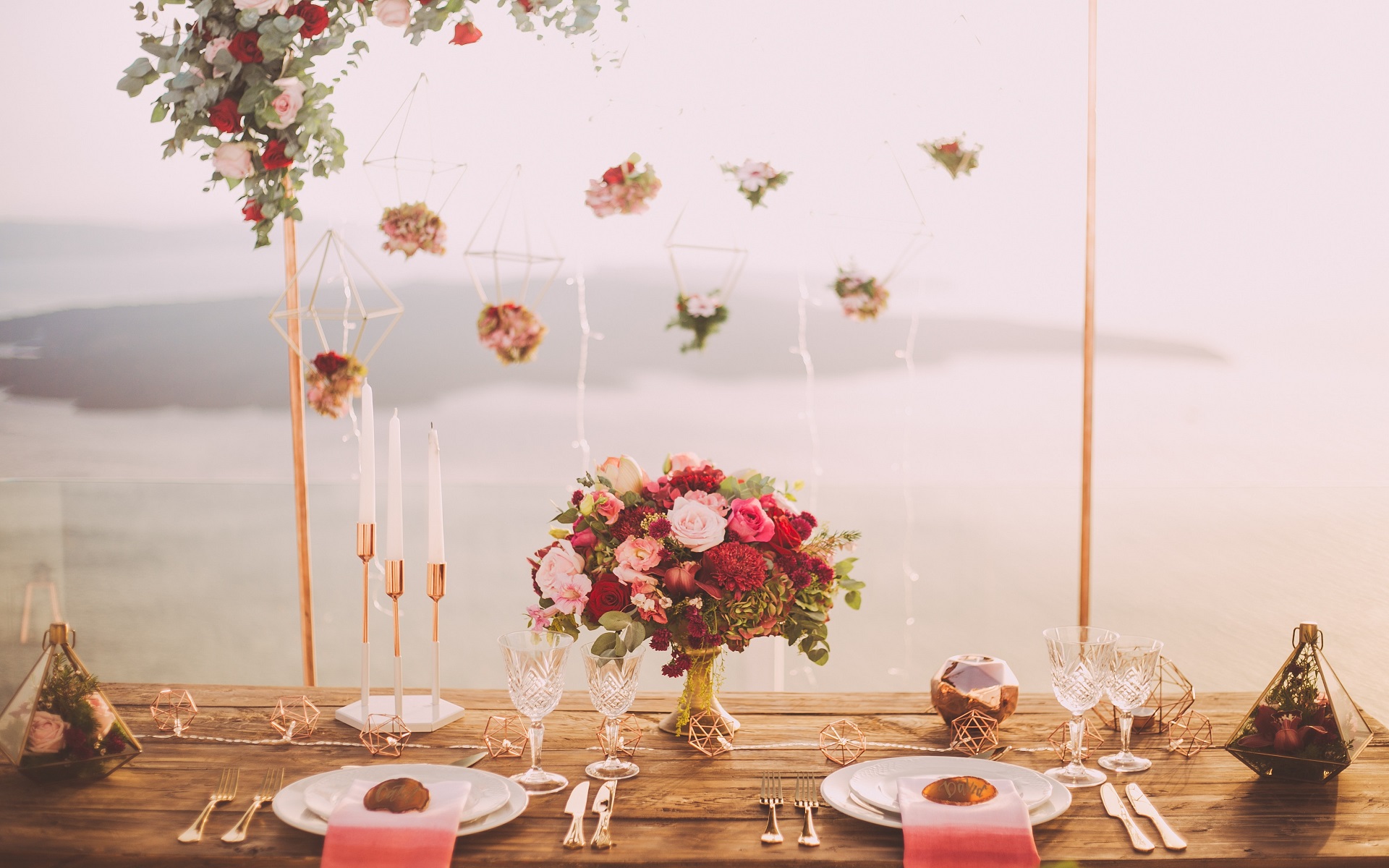 'Image of a peaceful meal outside with the ocean scenary'